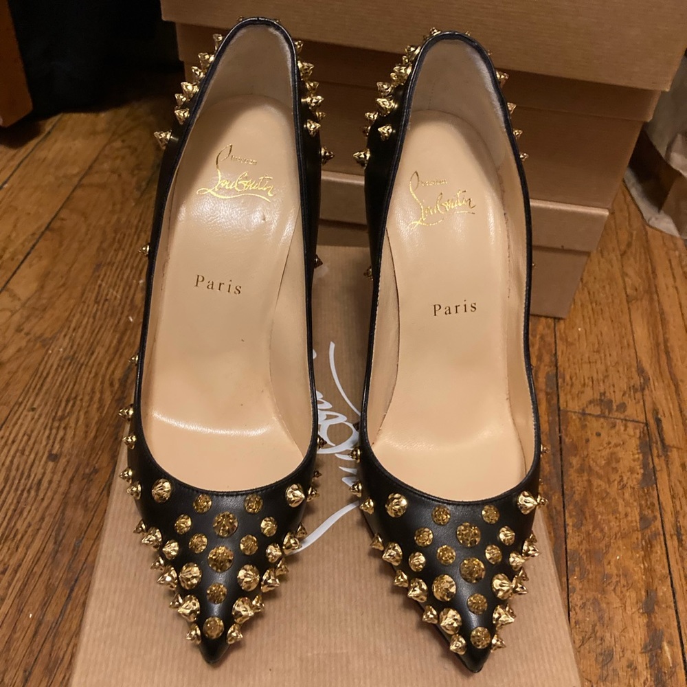 Christian Louboutin Aimantaclou black/gold pointed toe pump.